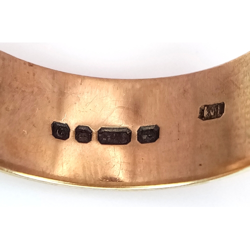 9 - A 9K Yellow Gold Band Ring. Full UK hallmarks. 8mm width. Size U. 6.9g.