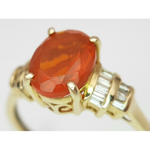 43 - A 14K Yellow Gold, Fire Opal and Diamond Ring. Oval cut 1.5ct fire opal with tapered baguette diamon... 