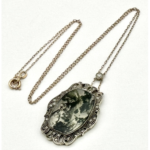 349 - An Antique Gold (tests as 18K), Silver, Diamond, Rutilated Quartz Art Deco Pendant - On a 14K yellow... 