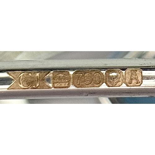 41 - A 20ct Marquise Cut Ice Blue Topaz in an 18K White Gold and Diamond Cage - Pendant. 7g total weight.... 