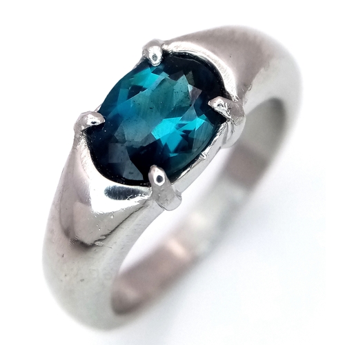 218 - A 900 Platinum, Teal Sapphire Ring. 1.5ct oval cut sapphire.
Size M. 9.75g total weight.