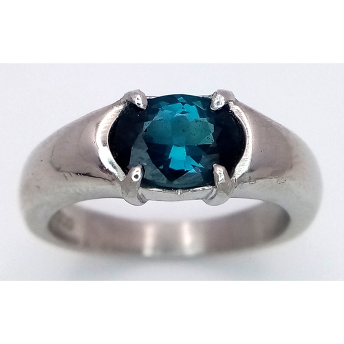 218 - A 900 Platinum, Teal Sapphire Ring. 1.5ct oval cut sapphire.
Size M. 9.75g total weight.