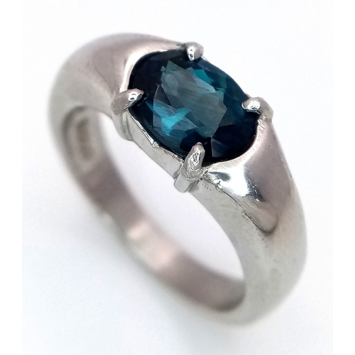 218 - A 900 Platinum, Teal Sapphire Ring. 1.5ct oval cut sapphire.
Size M. 9.75g total weight.