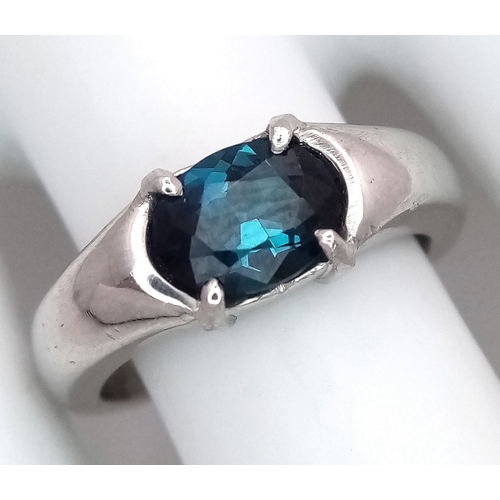 218 - A 900 Platinum, Teal Sapphire Ring. 1.5ct oval cut sapphire.
Size M. 9.75g total weight.
