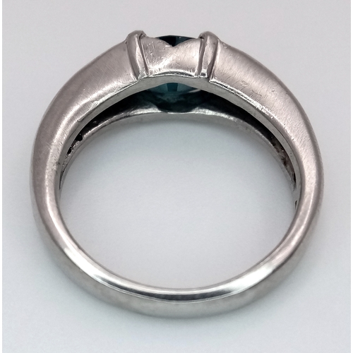218 - A 900 Platinum, Teal Sapphire Ring. 1.5ct oval cut sapphire.
Size M. 9.75g total weight.