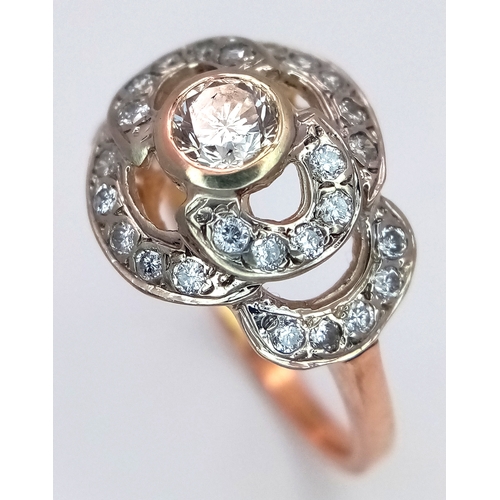 241 - A Vintage 14K Yellow Gold Diamond Cluster Ring. Central 0.3ct round brilliant cut diamond with a thi... 
