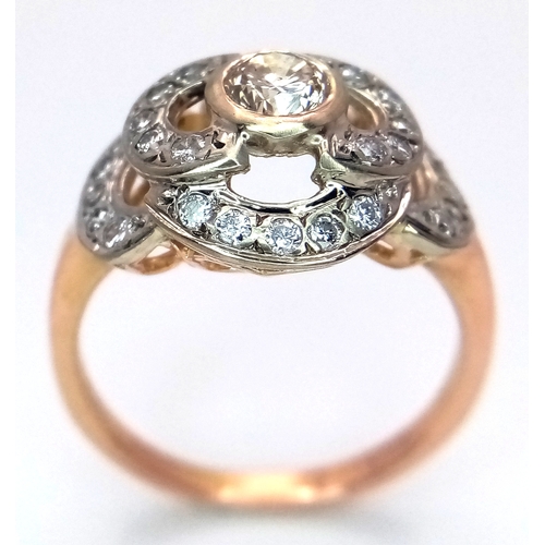 241 - A Vintage 14K Yellow Gold Diamond Cluster Ring. Central 0.3ct round brilliant cut diamond with a thi... 