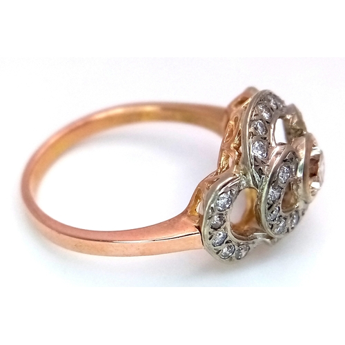 241 - A Vintage 14K Yellow Gold Diamond Cluster Ring. Central 0.3ct round brilliant cut diamond with a thi... 
