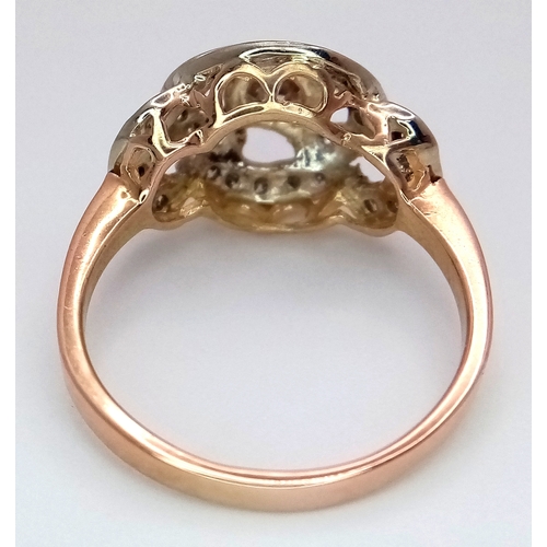 241 - A Vintage 14K Yellow Gold Diamond Cluster Ring. Central 0.3ct round brilliant cut diamond with a thi... 