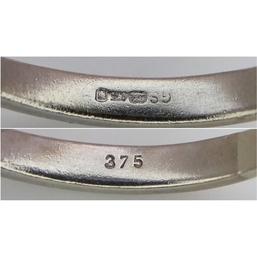 344 - A 9K Yellow Gold Emerald Cut Blue Topaz and Diamond Ring. 1ct centre stone with diamond accents. Siz... 