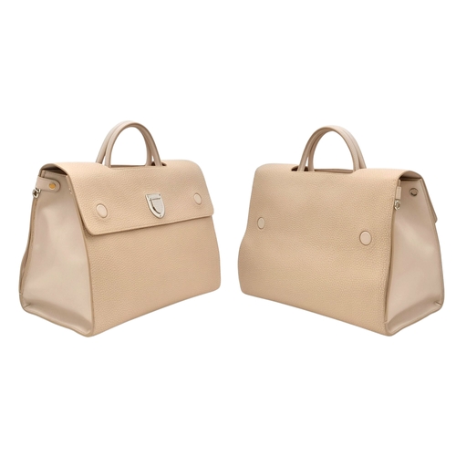 95 - A Christian Dior Beige Grained Calfskin Diorama Satchel Bag. Beigh textile exterior with silver-tone... 