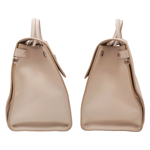 95 - A Christian Dior Beige Grained Calfskin Diorama Satchel Bag. Beigh textile exterior with silver-tone... 