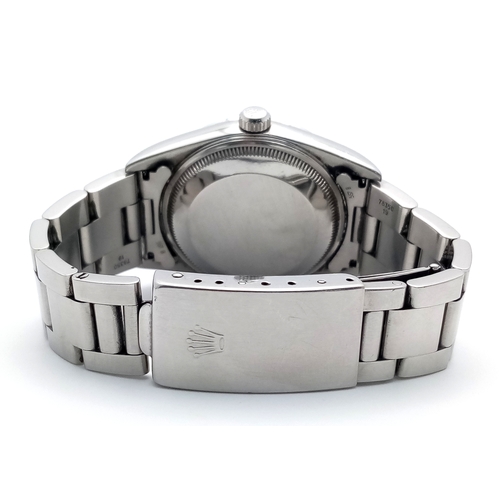 17 - A Rolex Oyster Perpetual Date Automatic Gents Watch. Model 15200. Stainless steel bracelet and case ... 