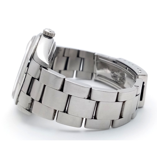 17 - A Rolex Oyster Perpetual Date Automatic Gents Watch. Model 15200. Stainless steel bracelet and case ... 