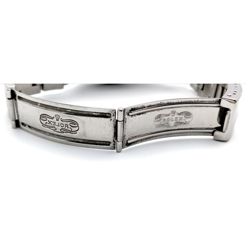 17 - A Rolex Oyster Perpetual Date Automatic Gents Watch. Model 15200. Stainless steel bracelet and case ... 