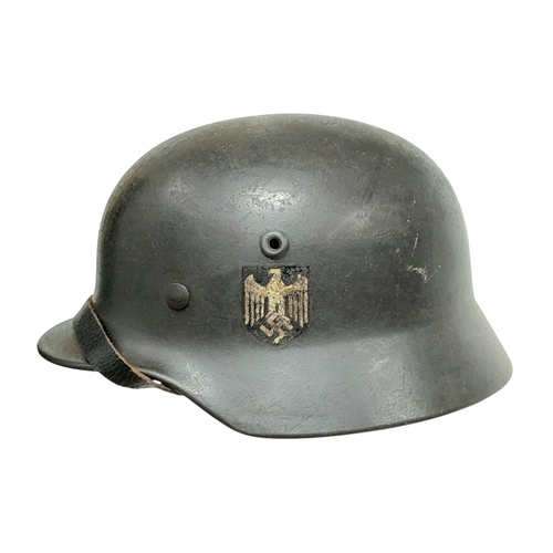 185 - WW2 German Double Decal M40 Helmet with liner and chin strap. Maker Quist Esslingen. Size 64.