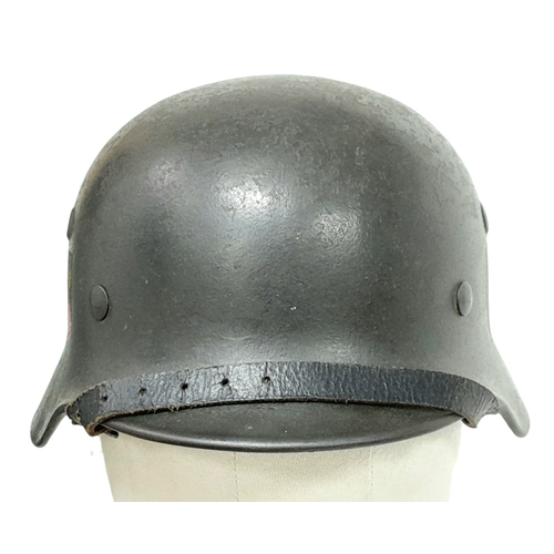 185 - WW2 German Double Decal M40 Helmet with liner and chin strap. Maker Quist Esslingen. Size 64.