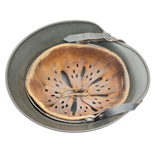 185 - WW2 German Double Decal M40 Helmet with liner and chin strap. Maker Quist Esslingen. Size 64.