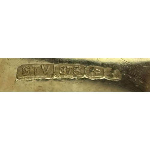 186 - A 9k Yellow Gold, Blue Sapphire Ring. Four 1.840ctw Oval cut Nigerian Sapphires with further accents... 