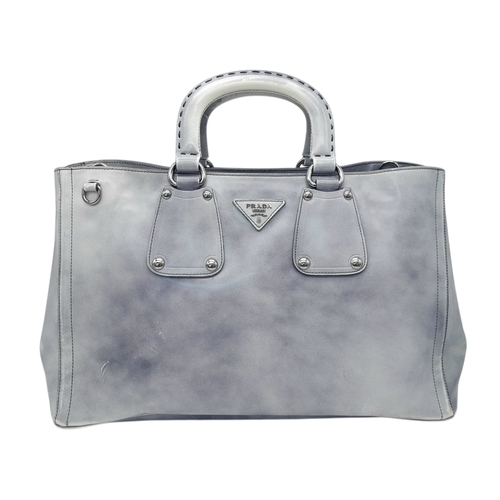 215 - A Prada Silver Vitello Daino Leather Tote Bag. Silver metallic-finish leather exterior with silver-t... 