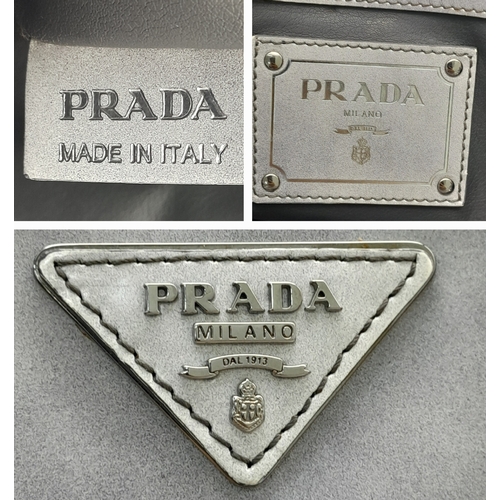 215 - A Prada Silver Vitello Daino Leather Tote Bag. Silver metallic-finish leather exterior with silver-t... 
