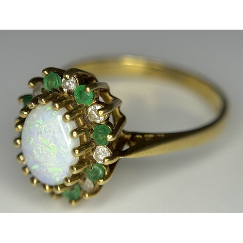 248 - A 9K Yellow Gold, Opal, Emerald and Diamond Ring. Size M. 2.55g total weight. N12/3755