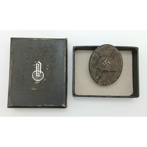 254 - Boxed WW2 German Black (iron) 3rd Class Wound Badge By Ldo. Marked L/14 For the maker: L. Chr. Lauer... 