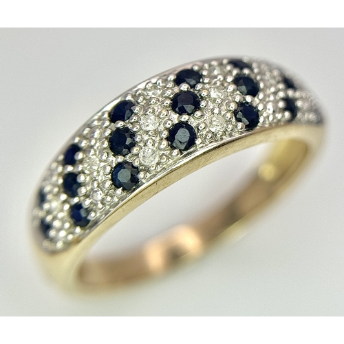 260 - A 9K YELLOW GOLD DIAMOND AND SAPPHIRE SET RING. 2.4G TOTAL WEIGHT, SIZE M. Ref: SC 2039