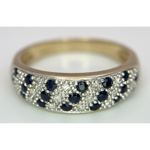 260 - A 9K YELLOW GOLD DIAMOND AND SAPPHIRE SET RING. 2.4G TOTAL WEIGHT, SIZE M. Ref: SC 2039
