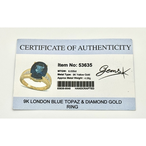 262 - A 9K Yellow Gold, London Blue Topaz and Diamond Ring. A 5.979ct, oval cut topaz with 0.056ct of Diam... 