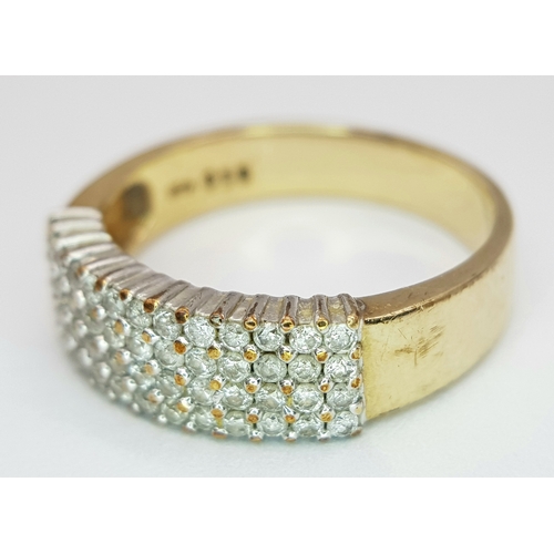 267 - A 9K YELLOW GOLD DIAMOND FOUR ROW RING. 0.50CTW, 3.5G TOTAL WEIGHT, SIZE P. Ref: SC 2043