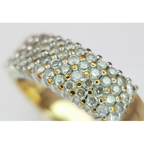 267 - A 9K YELLOW GOLD DIAMOND FOUR ROW RING. 0.50CTW, 3.5G TOTAL WEIGHT, SIZE P. Ref: SC 2043