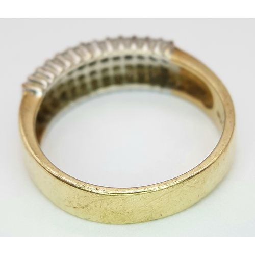 267 - A 9K YELLOW GOLD DIAMOND FOUR ROW RING. 0.50CTW, 3.5G TOTAL WEIGHT, SIZE P. Ref: SC 2043