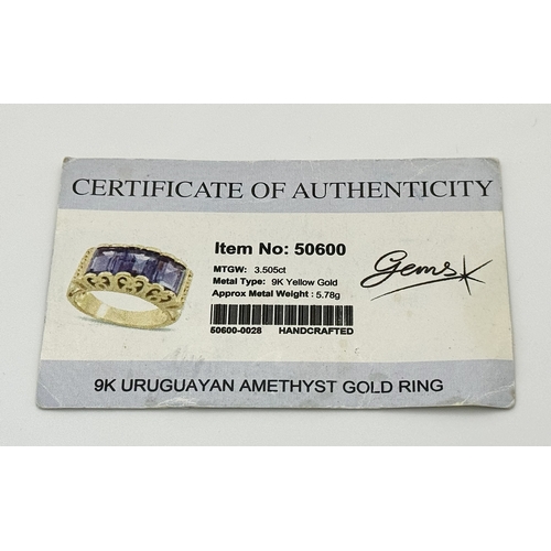 269 - A 9K Yellow Gold Amethyst Ring. Three Uruguayan Octagon Cut Amethysts - 3.505ctw. Size M 1/2. 6.53g ... 