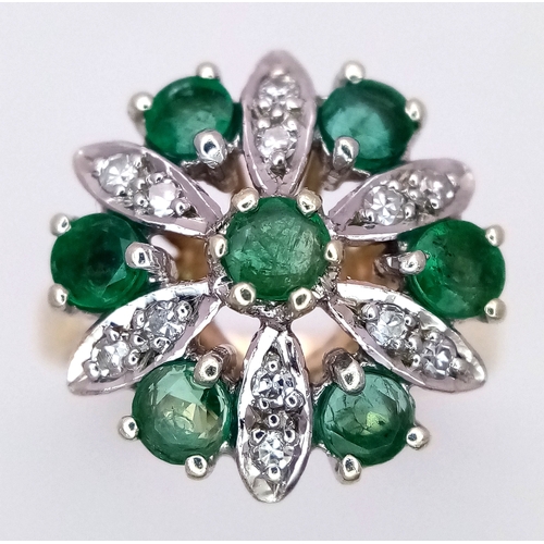 274 - A 9K YELLOW GOLD DIAMOND AND EMERALD CLUSTER RING. 4.2G TOTAL WEIGHT, SIZE N. Ref: SC 2045