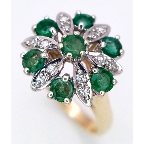 274 - A 9K YELLOW GOLD DIAMOND AND EMERALD CLUSTER RING. 4.2G TOTAL WEIGHT, SIZE N. Ref: SC 2045