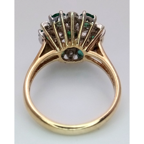 274 - A 9K YELLOW GOLD DIAMOND AND EMERALD CLUSTER RING. 4.2G TOTAL WEIGHT, SIZE N. Ref: SC 2045