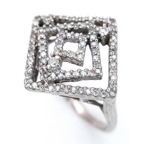 288 - A 9K WHITE GOLD DIAMOND SET ABSTRACT DESIGN RING. 3.5G TOTAL WEIGHT, SIZE P. Ref: SC 2047