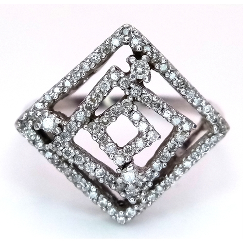 288 - A 9K WHITE GOLD DIAMOND SET ABSTRACT DESIGN RING. 3.5G TOTAL WEIGHT, SIZE P. Ref: SC 2047