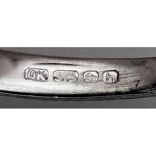 288 - A 9K WHITE GOLD DIAMOND SET ABSTRACT DESIGN RING. 3.5G TOTAL WEIGHT, SIZE P. Ref: SC 2047