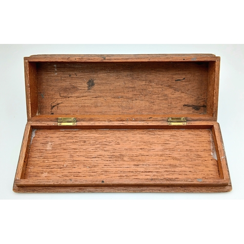 289 - WW2 German Kriegsmarine Tropical Helmet Eagle stuck on a Wooden Desk Top Cigar Box.