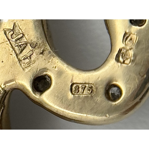 304 - A Playful 9K Gold, Diamond and Sapphire Panther Brooch. 1ctw of diamonds and 0.5ctw of sapphires. 5c... 