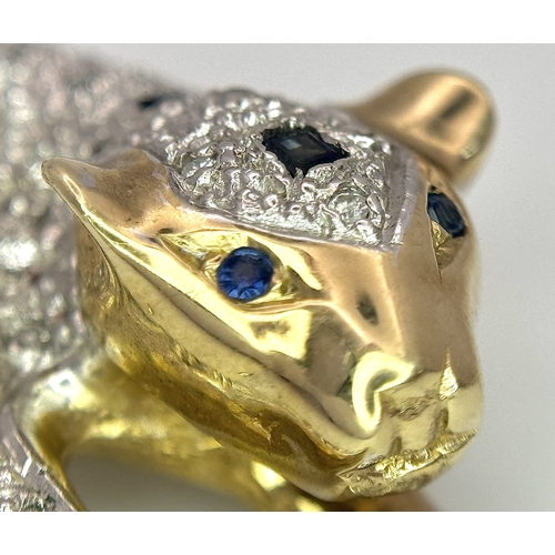 304 - A Playful 9K Gold, Diamond and Sapphire Panther Brooch. 1ctw of diamonds and 0.5ctw of sapphires. 5c... 