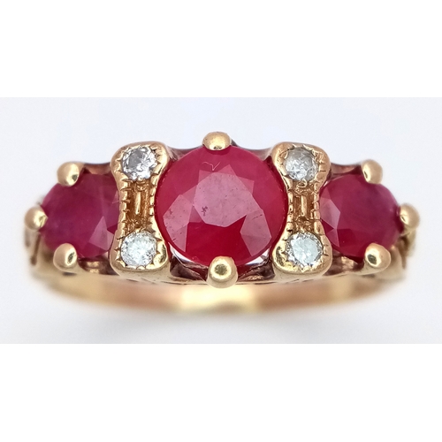 309 - A 9K YELLOW GOLD DIAMOND AND RUBY RING. 3.3G TOTAL WEIGHT. SIZE S. Ref: SC 2006