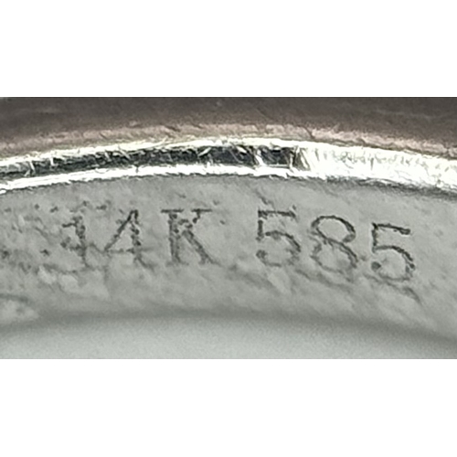 318 - A 14K White Gold, Sapphire and Diamond Ring. 0.35ct centre stone. Size I. 3g total weight. N28/33005... 