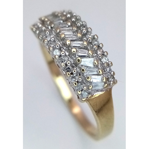 323 - A 9K YELLOW GOLD THREE ROW MIXED CUT DIAMOND RING. 0.20CTW, 2.4G TOTAL WEIGHT. SIZE P. Ref: SC 2028