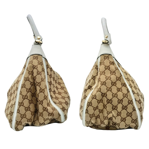 334 - A Gucci Brown GG Canvas and White Leather Abbey Shoulder Bag. Brown GG monogram canvas exterior with... 