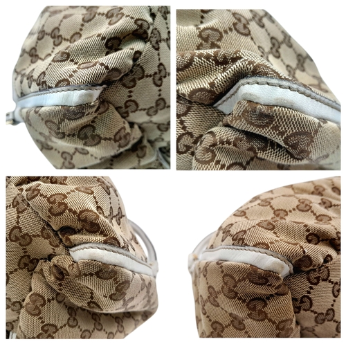 334 - A Gucci Brown GG Canvas and White Leather Abbey Shoulder Bag. Brown GG monogram canvas exterior with... 