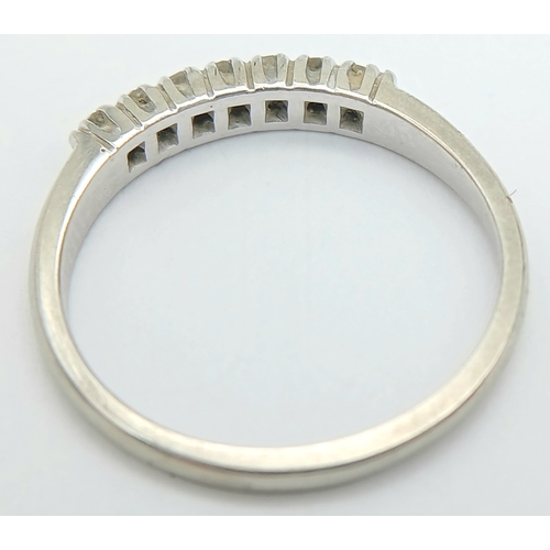 360 - 14 Carat White Gold Seven Diamond Ring Size M. The Ring is set with Seven 1.5mm Round Cut Diamonds. ... 