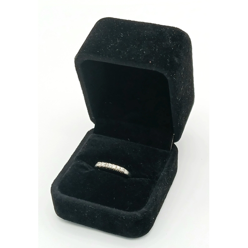 360 - 14 Carat White Gold Seven Diamond Ring Size M. The Ring is set with Seven 1.5mm Round Cut Diamonds. ... 